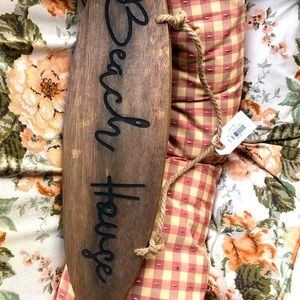 Beach house wooden sign. New